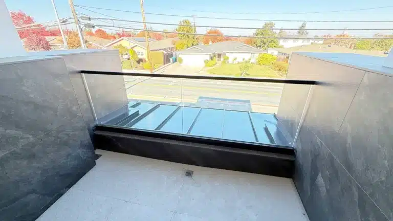 Black channel system glass railing